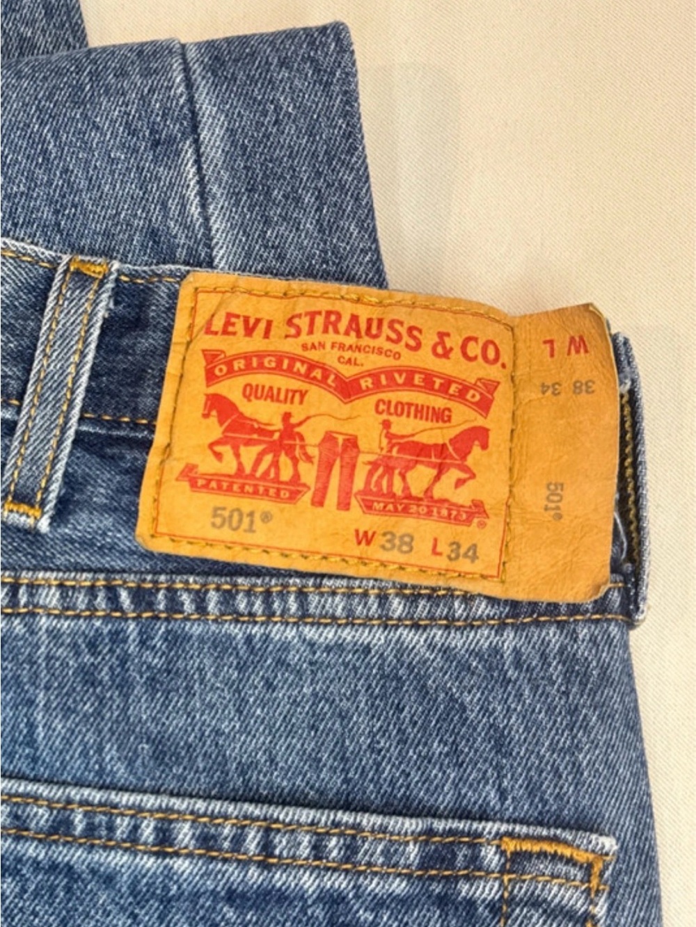 Levi's 501 Straight Jeans in Classic Blue with Tan Leather Patch